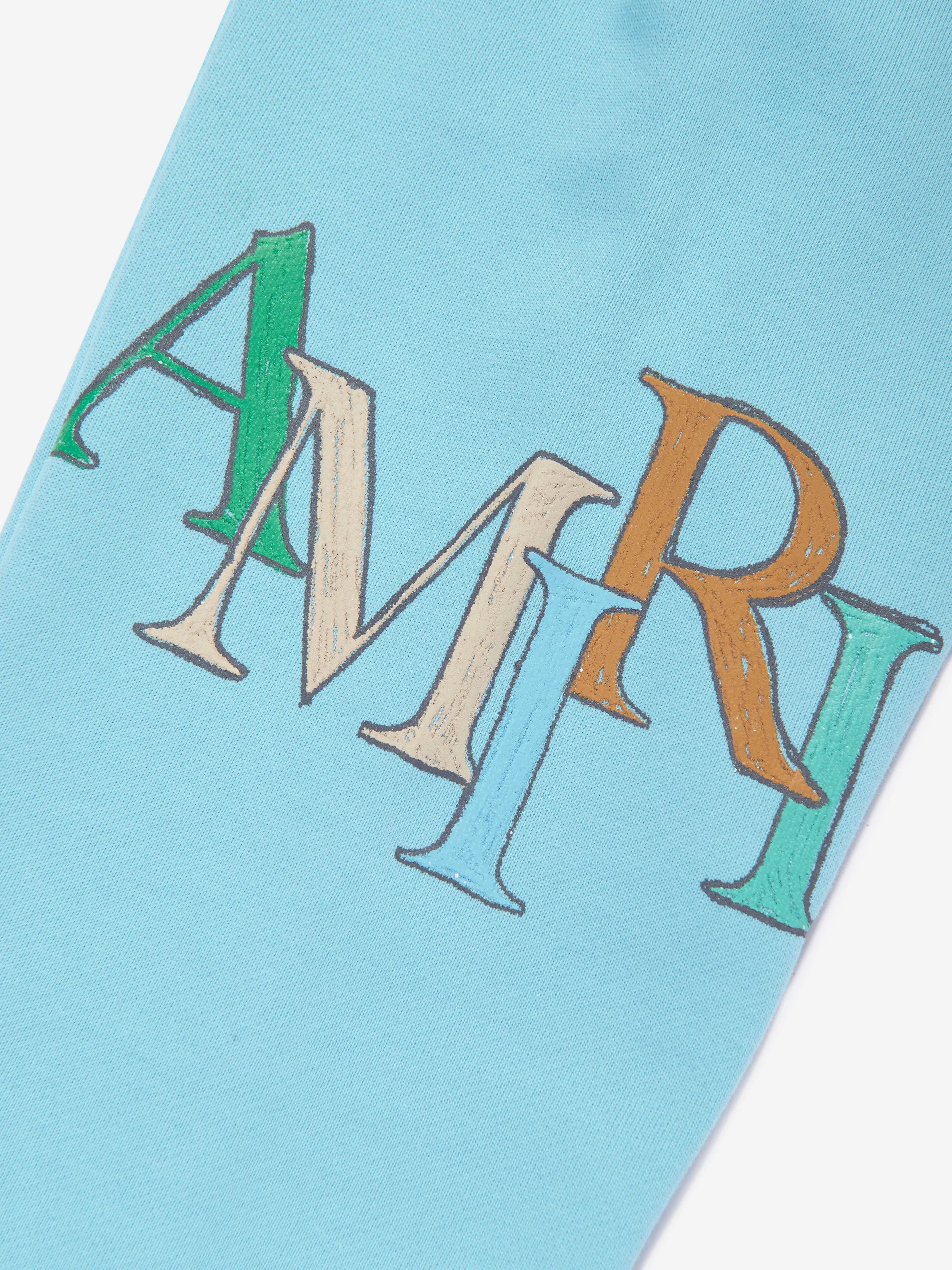 Amiri Kids Gestaffeltes Gekritzel-Logo Joggerhose in Blau