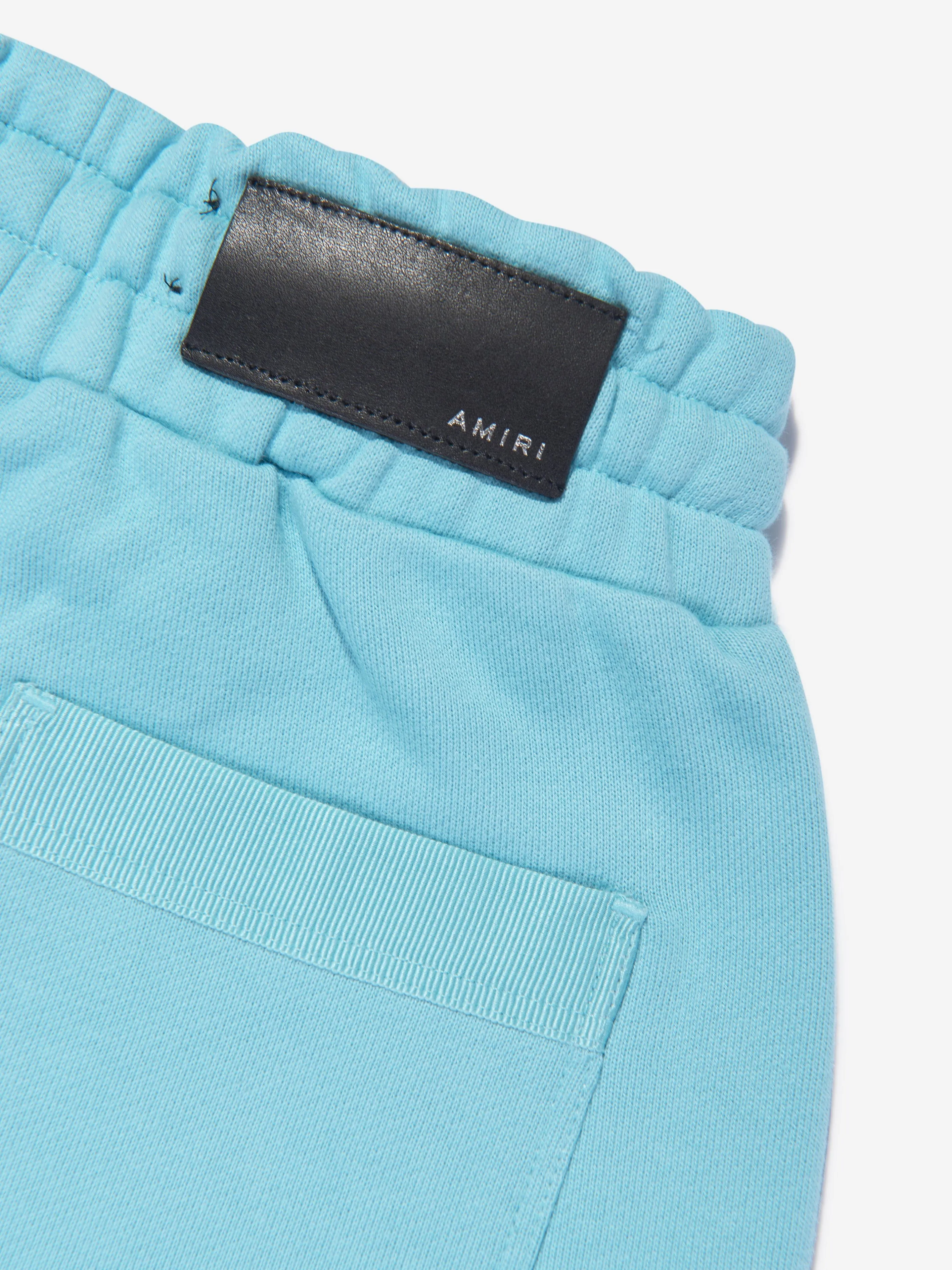 Amiri Kids Gestaffeltes Gekritzel-Logo Joggerhose in Blau