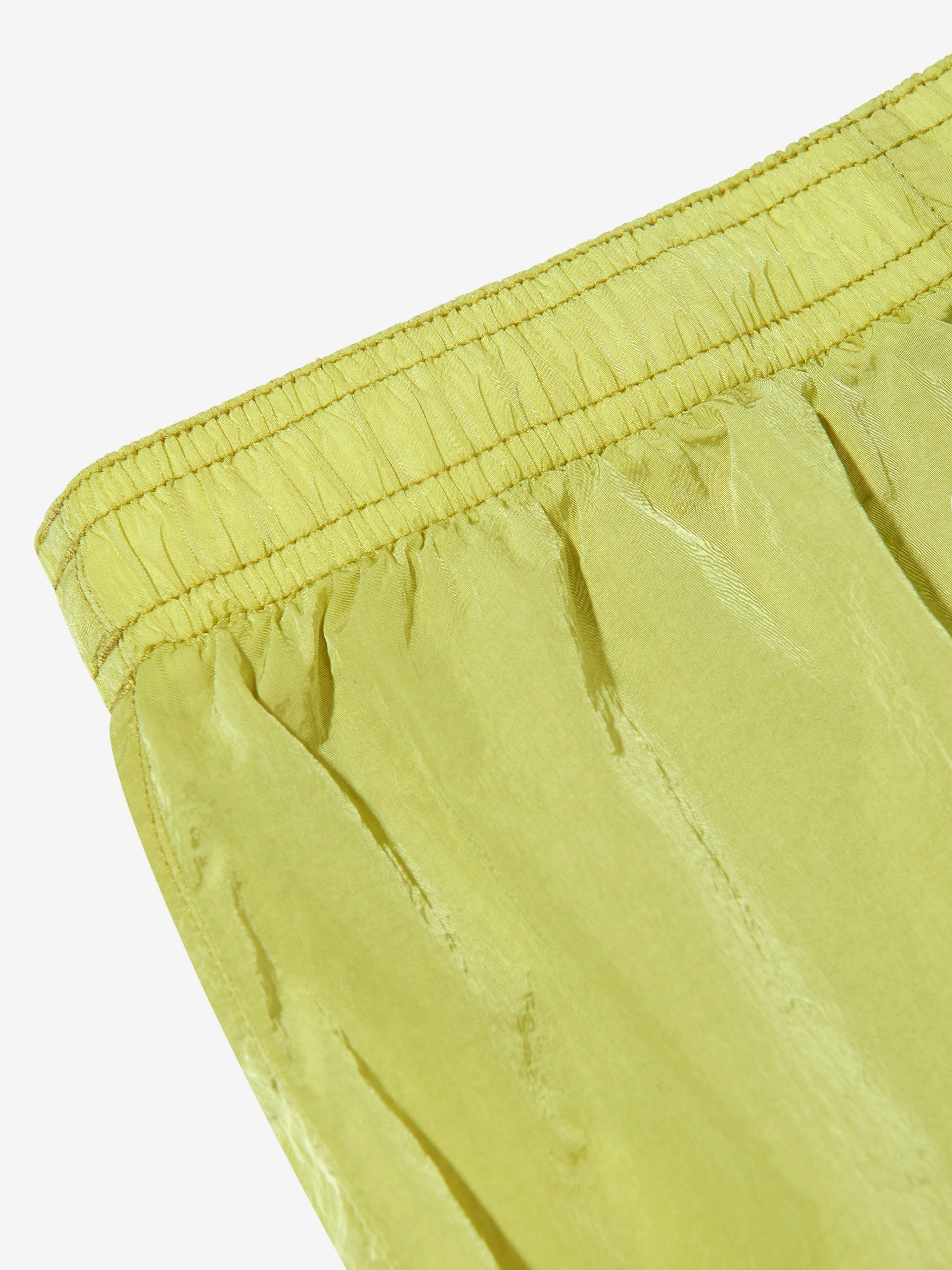 Jungen-Linsentaschen-Badeshorts in Grün