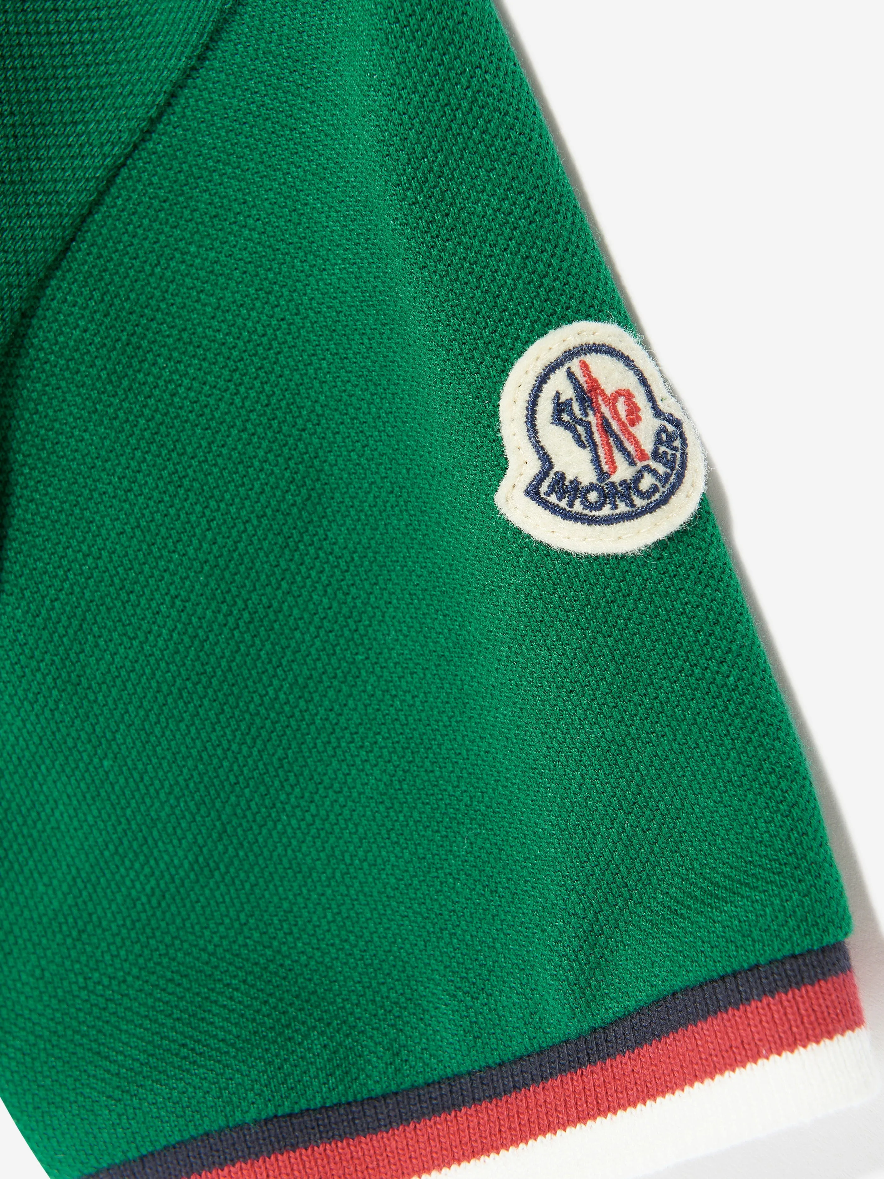 Grünes Logo Polohemd für Jungen