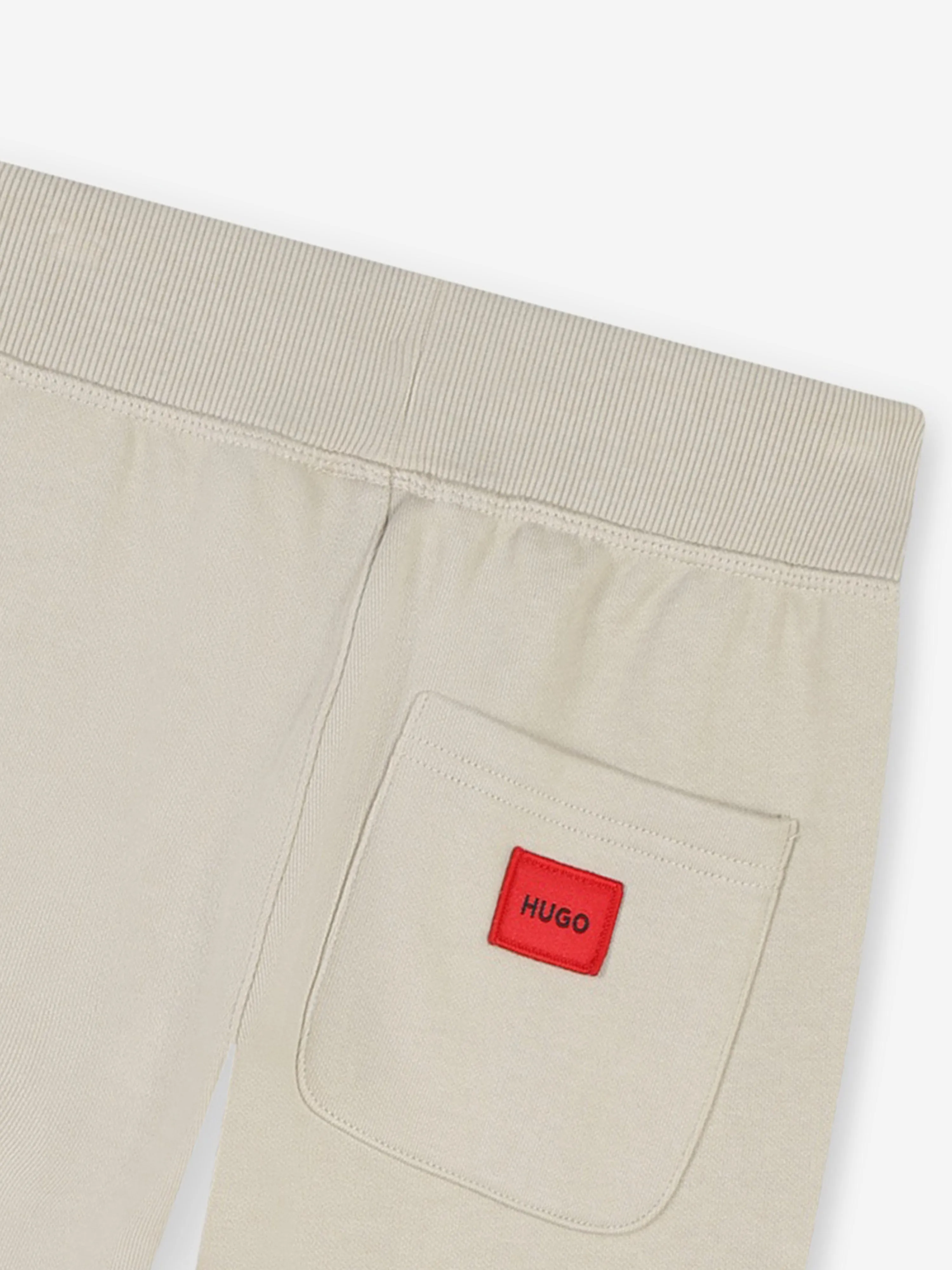Hugo Boys Logo Print Joggerhose in Beige
