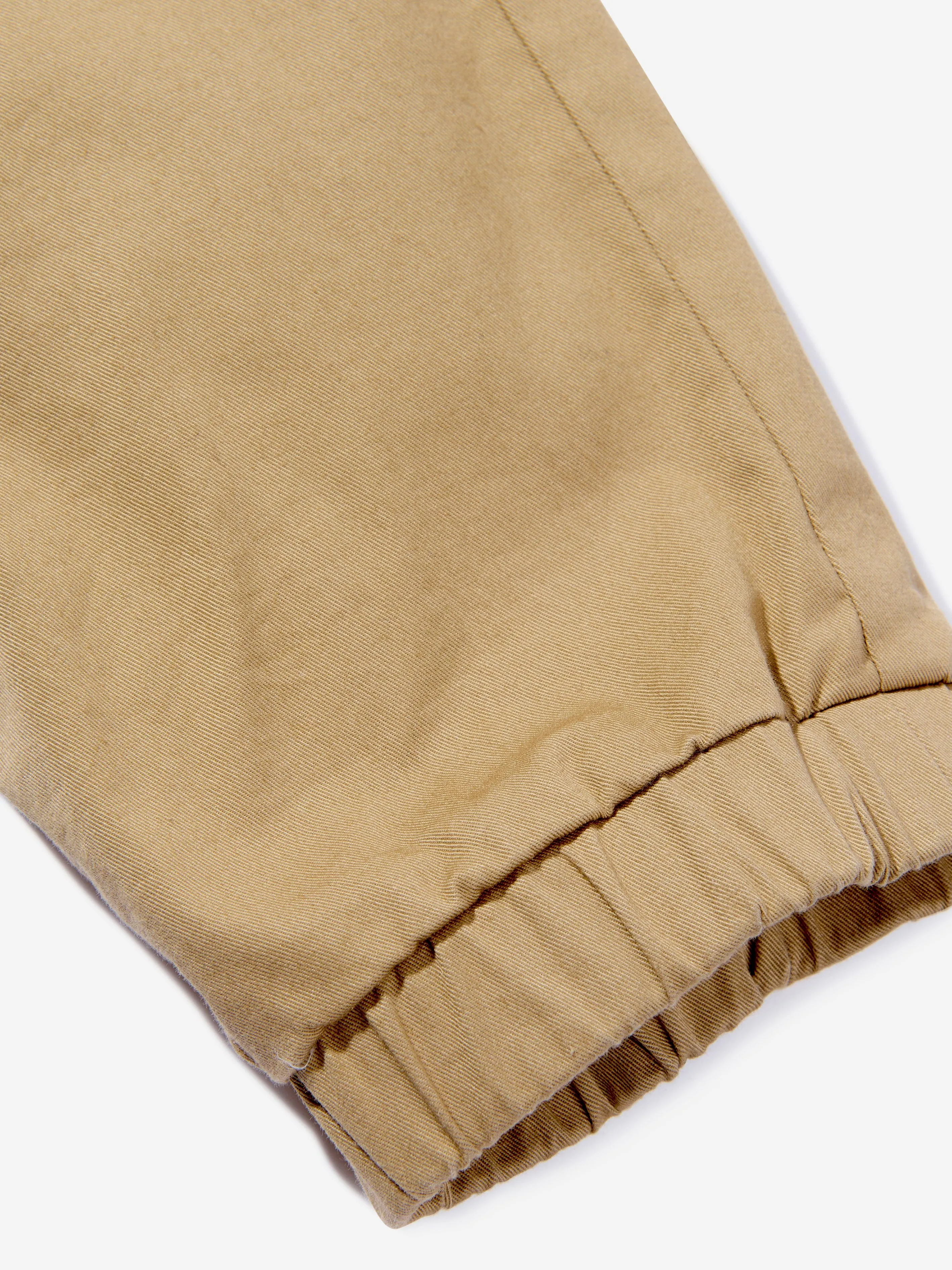 Moncler Enfant Baumwollhose für Jungen in Beige