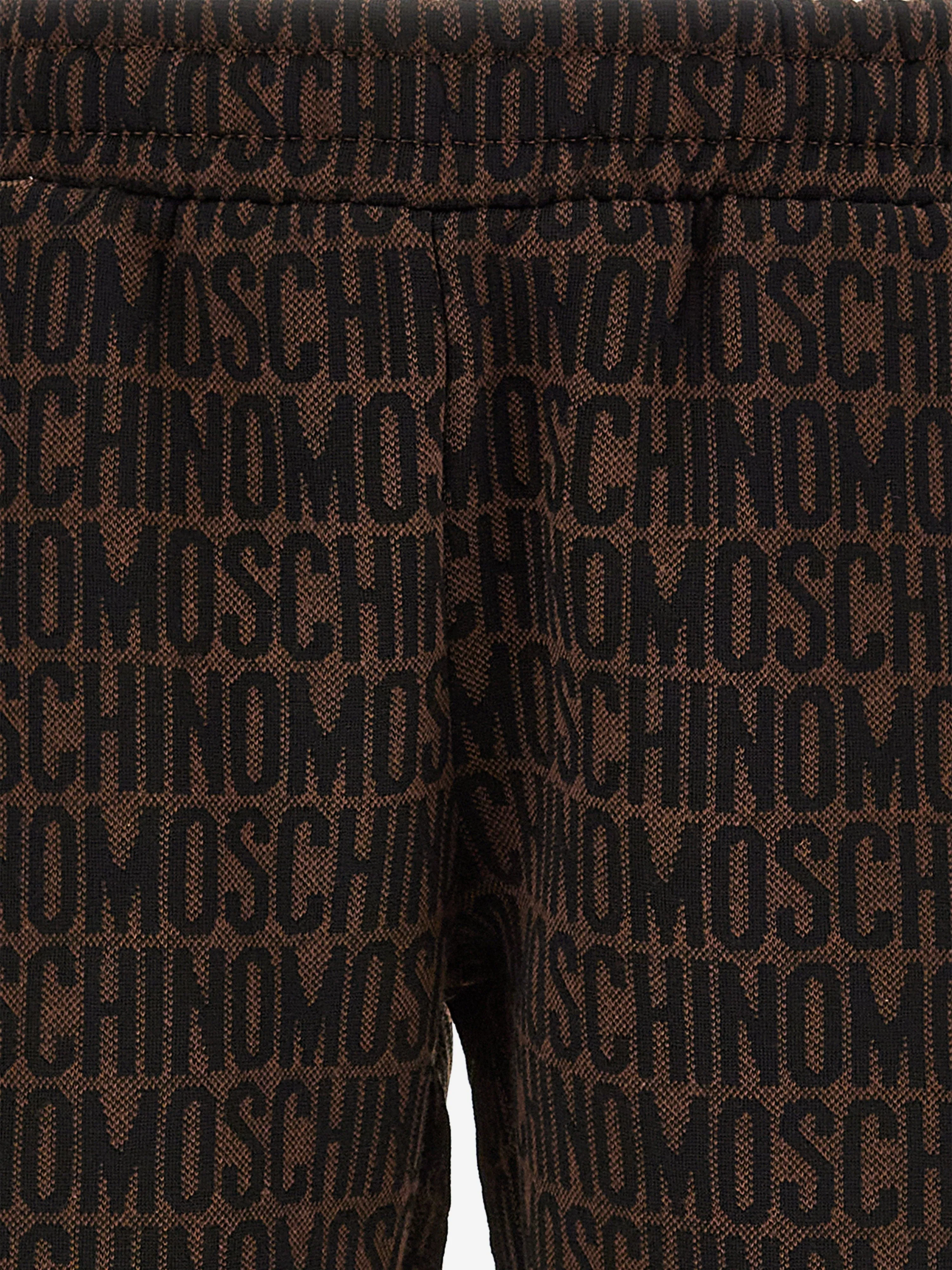 Moschino Boys All Over Logo Shorts in Braun