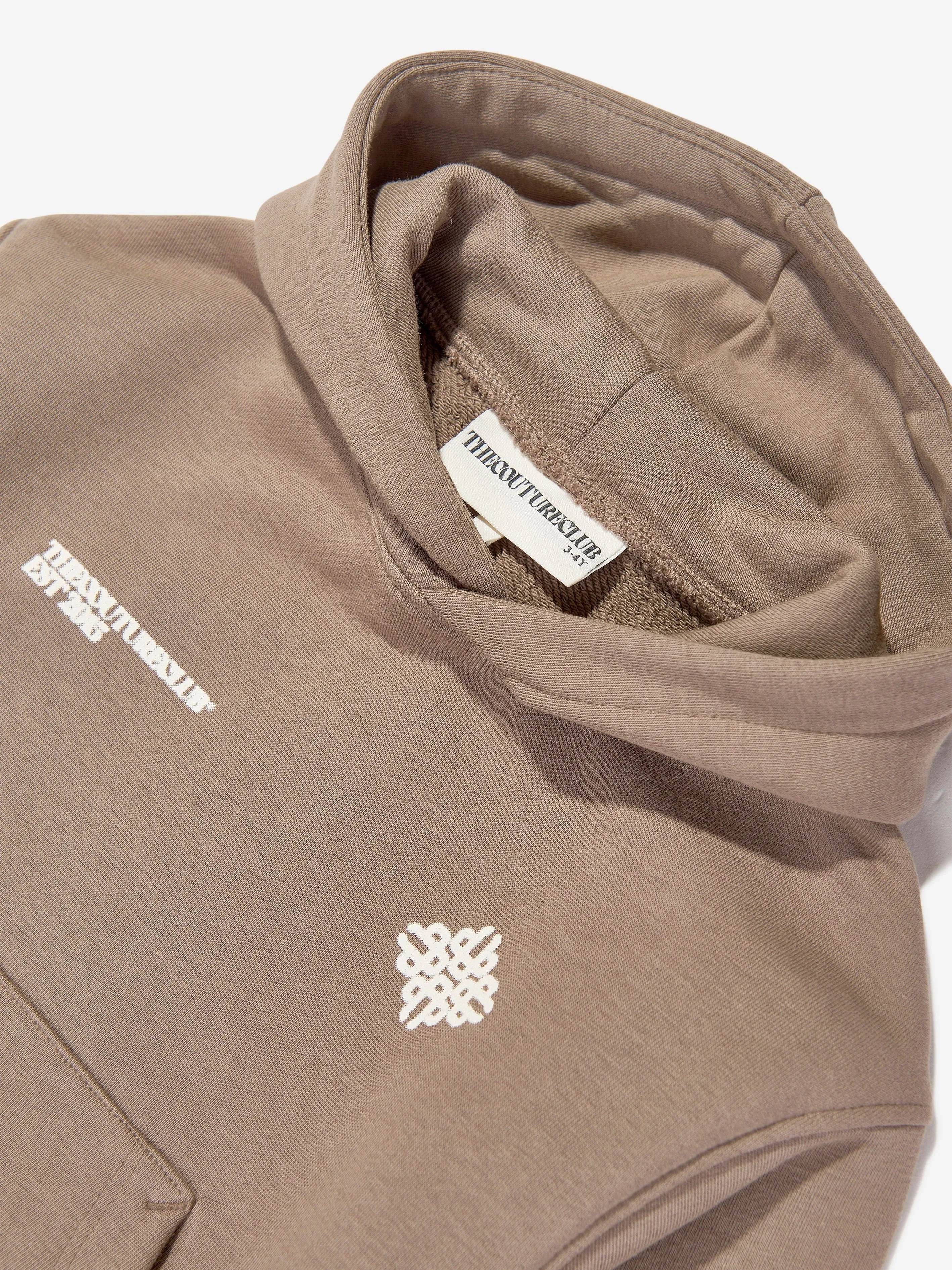 The Couture Club Kids Unschärfe-Grafik-Emblem Kapuzenpullover in Braun